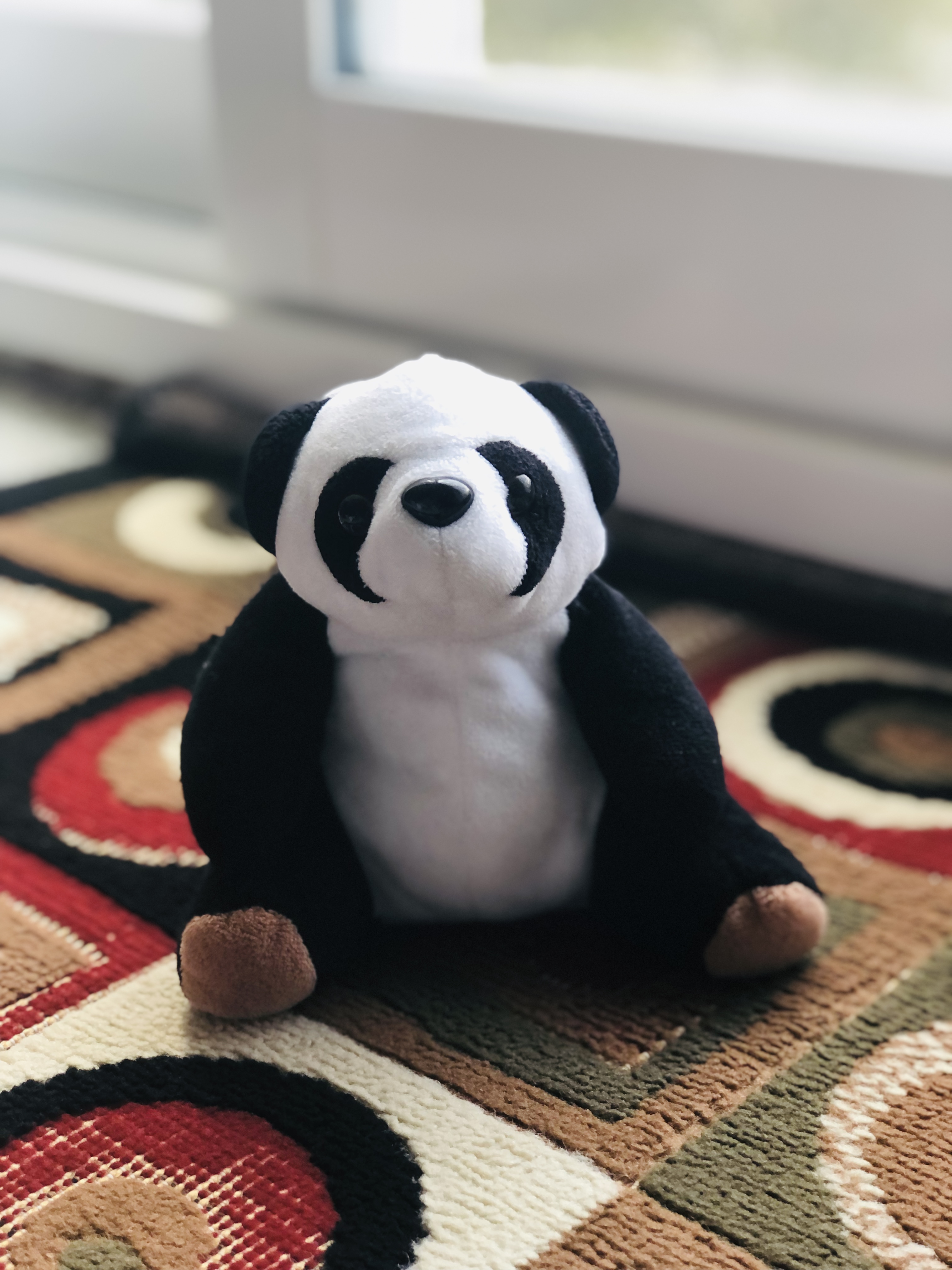 small stuffed panda